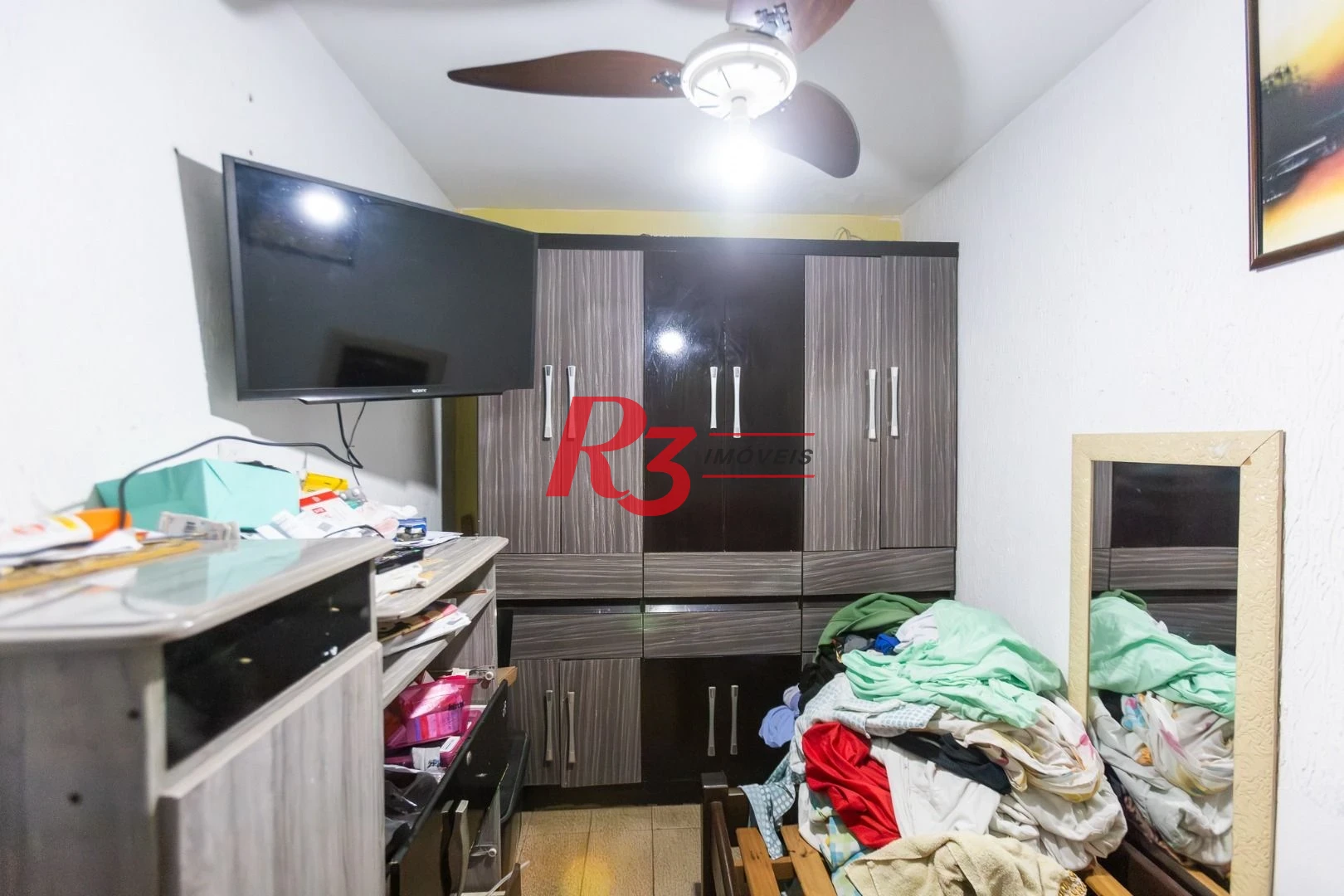 Sobrado com 4 dormitórios à venda, 93 m² por R$ 650.000,00 - Estuário - Santos/SP