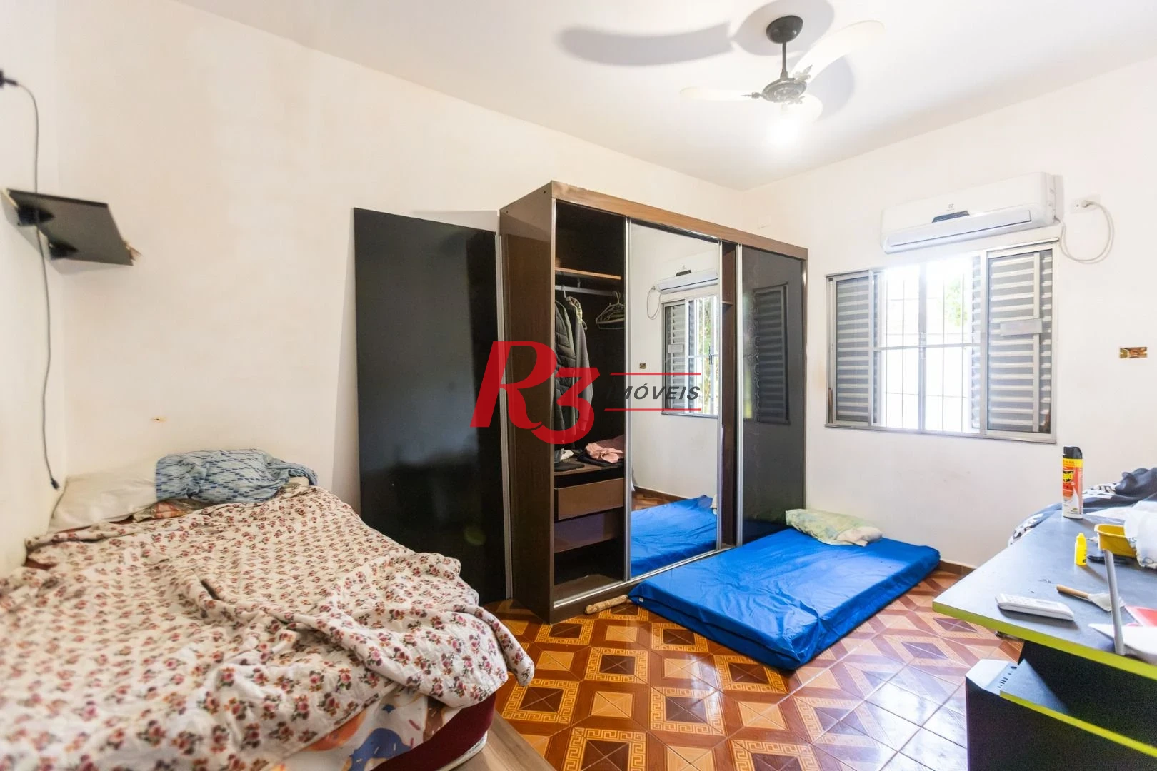 Sobrado com 4 dormitórios à venda, 93 m² por R$ 650.000,00 - Estuário - Santos/SP