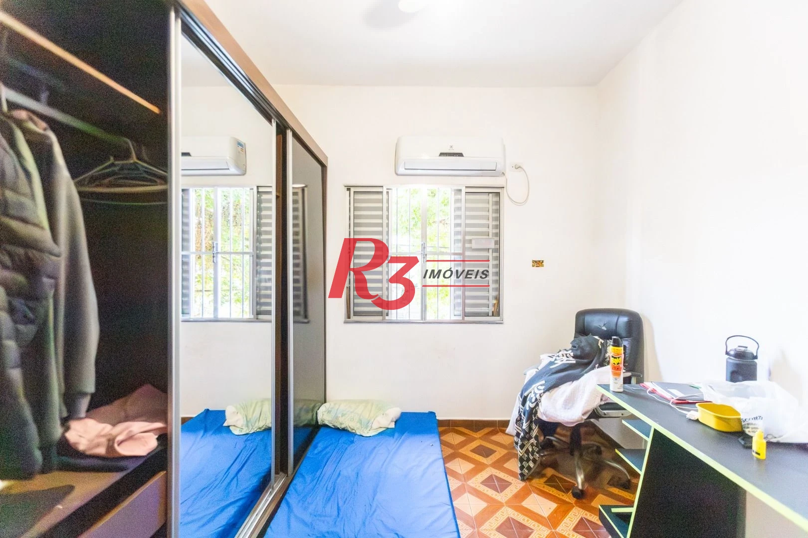 Sobrado com 4 dormitórios à venda, 93 m² por R$ 650.000,00 - Estuário - Santos/SP