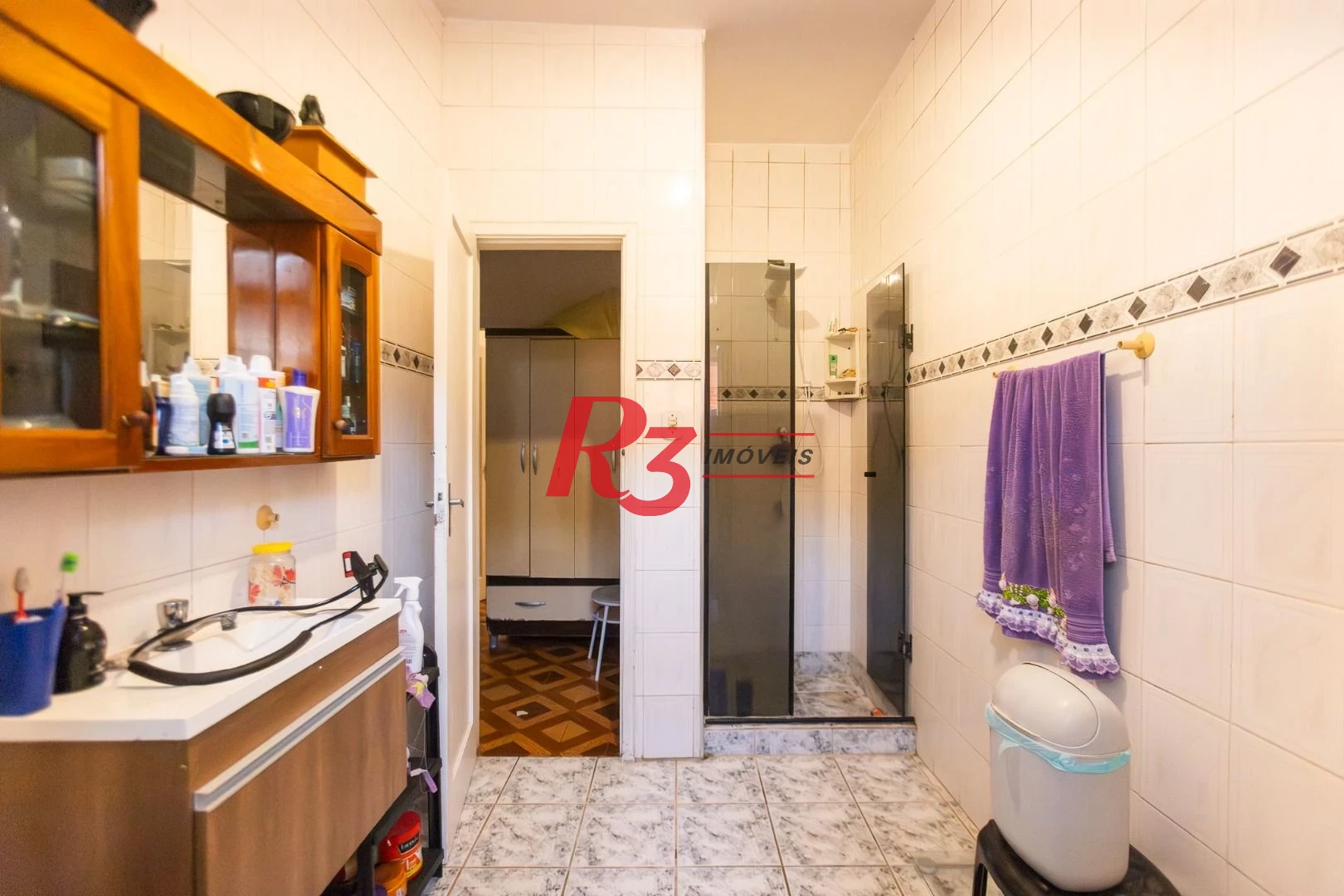 Sobrado com 4 dormitórios à venda, 93 m² por R$ 650.000,00 - Estuário - Santos/SP