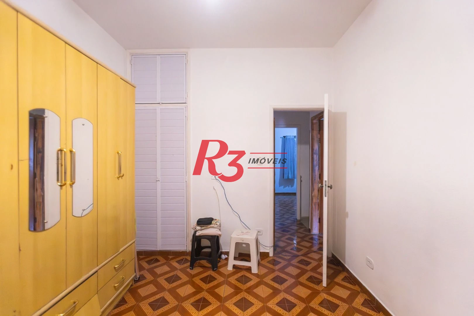 Sobrado com 4 dormitórios à venda, 93 m² por R$ 650.000,00 - Estuário - Santos/SP