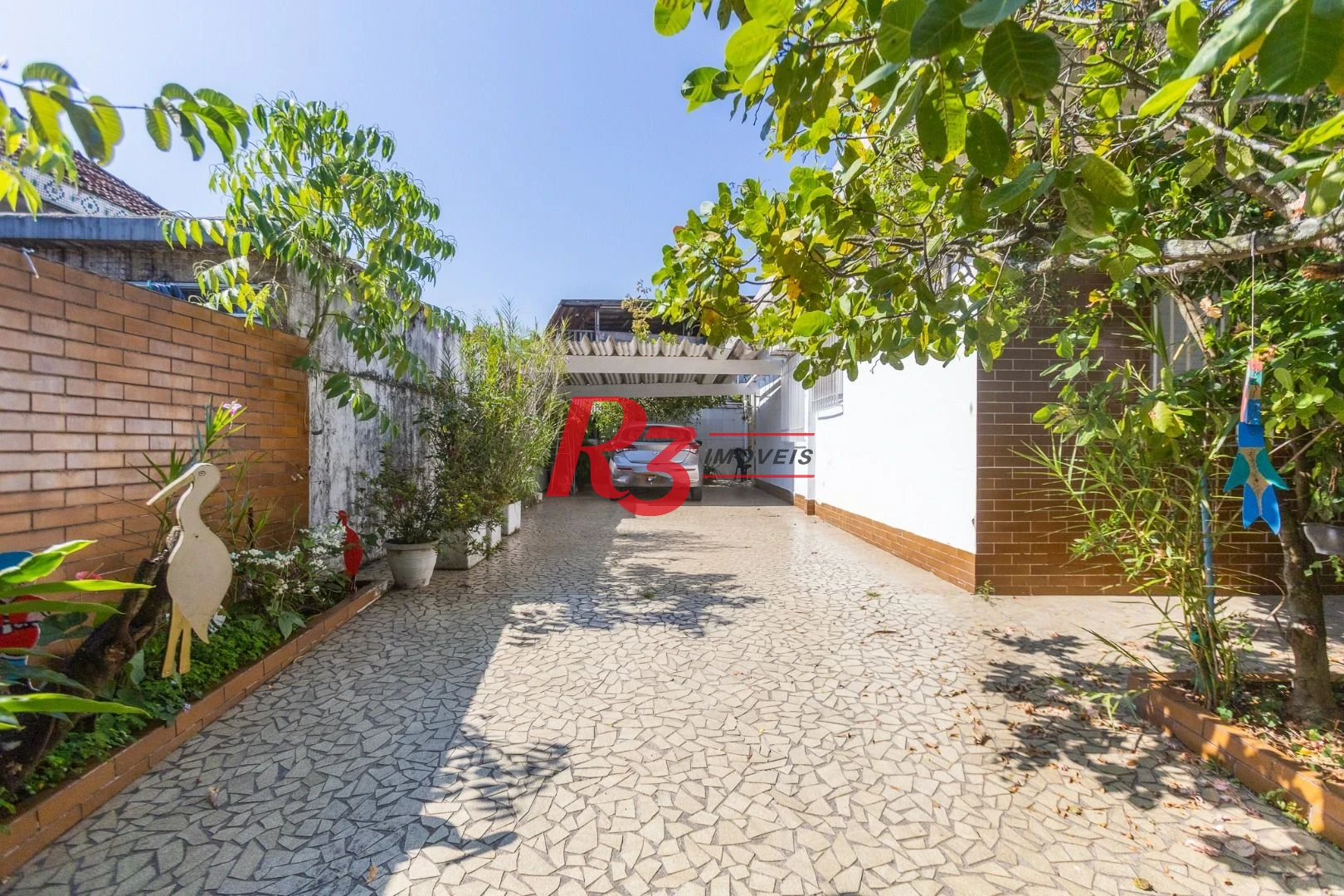 Casa com 3 dormitórios à venda, 320 m² por R$ 720.000,00 - Vila São Jorge - Santos/SP