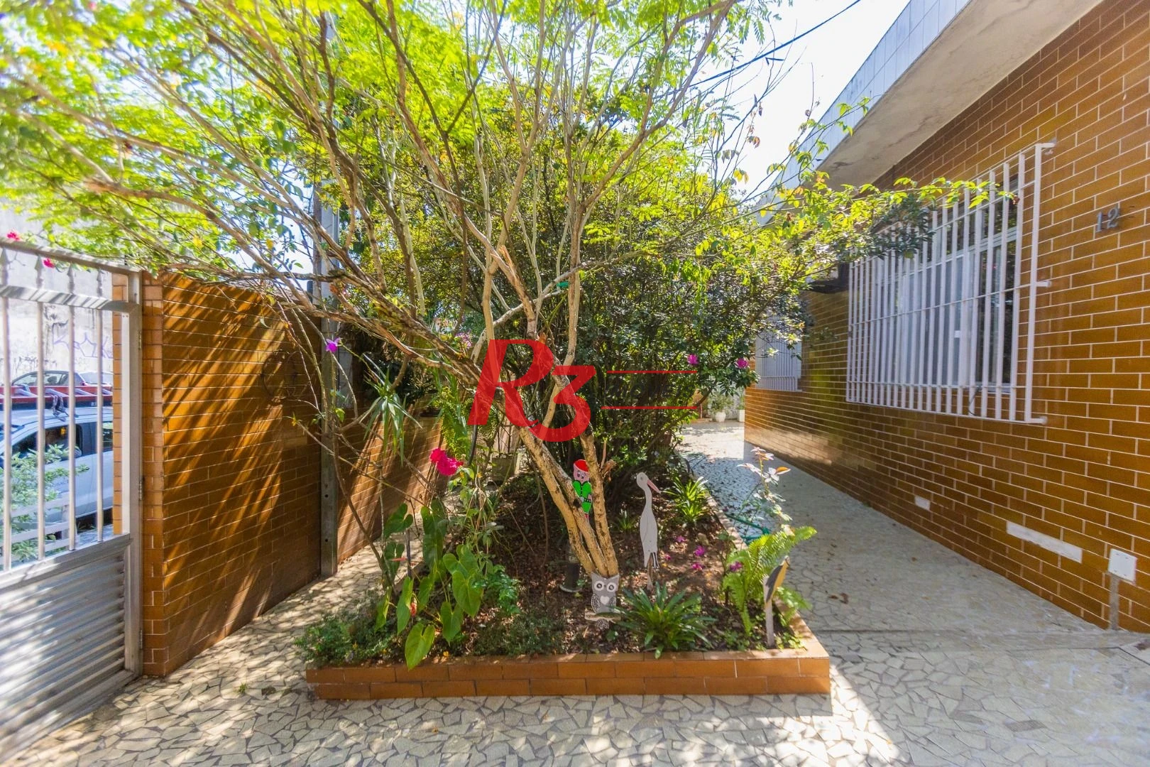 Casa com 3 dormitórios à venda, 320 m² por R$ 720.000,00 - Vila São Jorge - Santos/SP