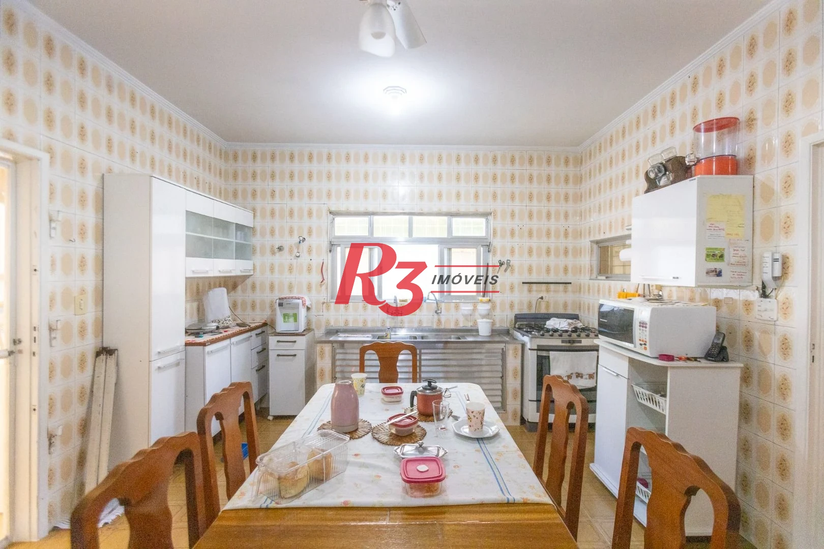 Casa com 3 dormitórios à venda, 320 m² por R$ 720.000,00 - Vila São Jorge - Santos/SP