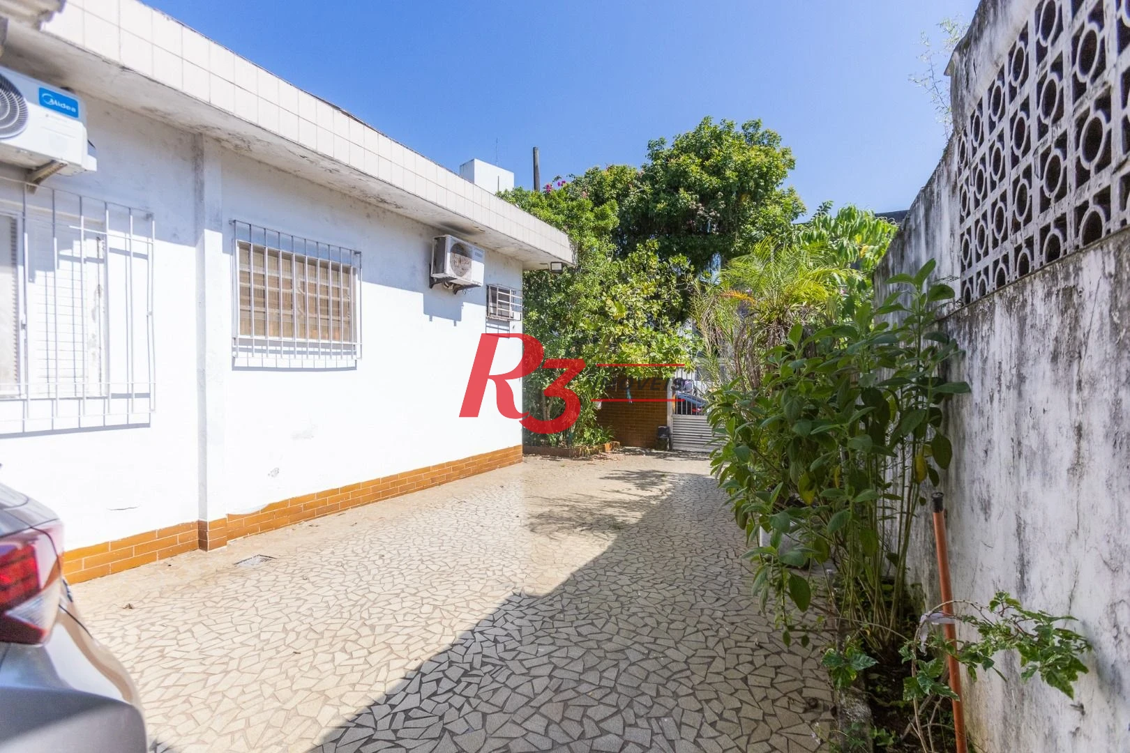Casa com 3 dormitórios à venda, 320 m² por R$ 720.000,00 - Vila São Jorge - Santos/SP