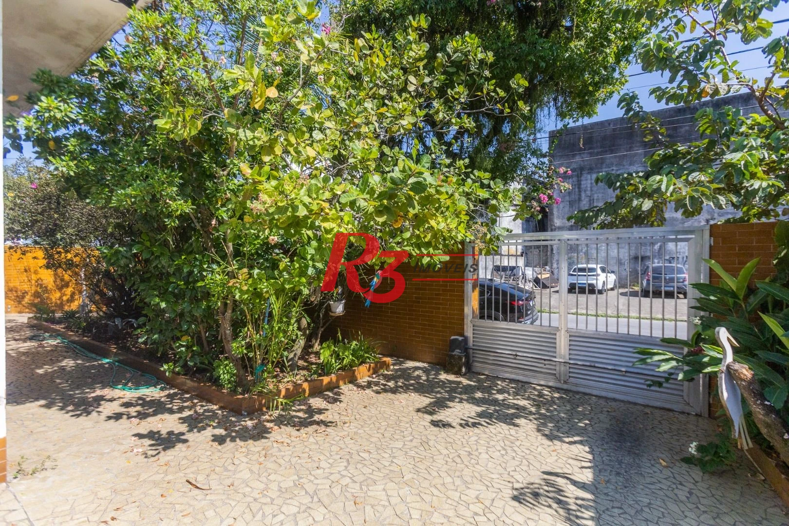 Casa com 3 dormitórios à venda, 320 m² por R$ 720.000,00 - Vila São Jorge - Santos/SP