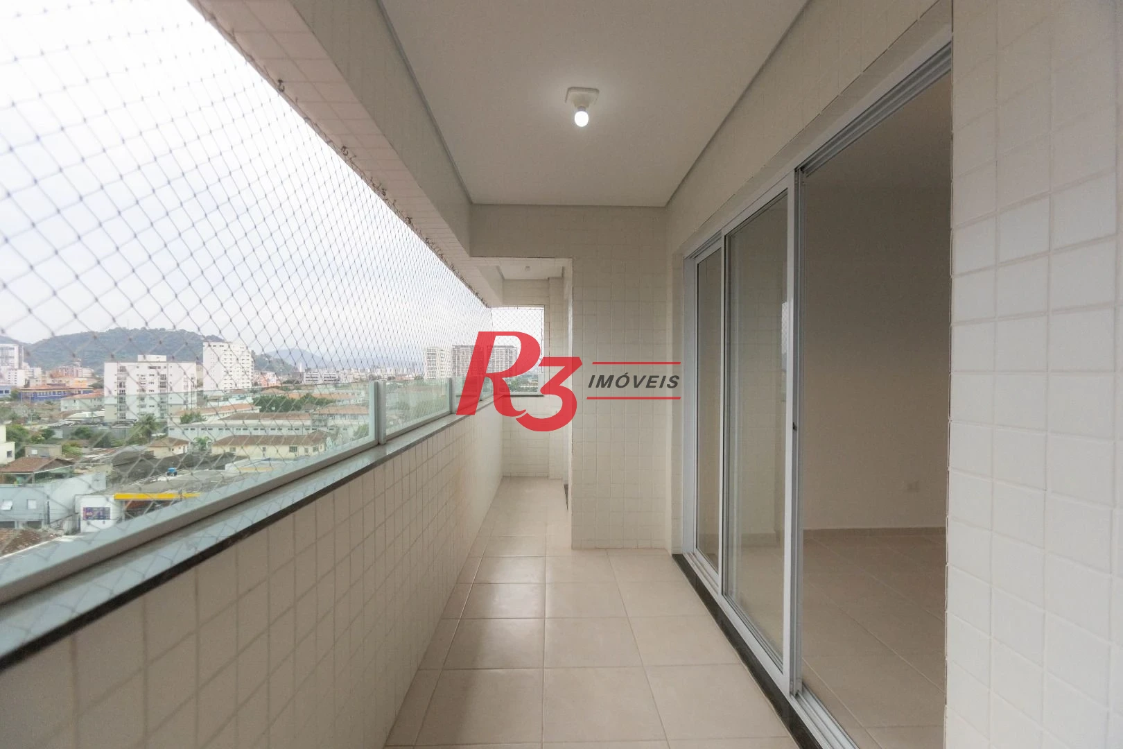 Apartamento com 2 dormitórios à venda, 61 m² por R$ 540.000,00 - Macuco - Santos/SP