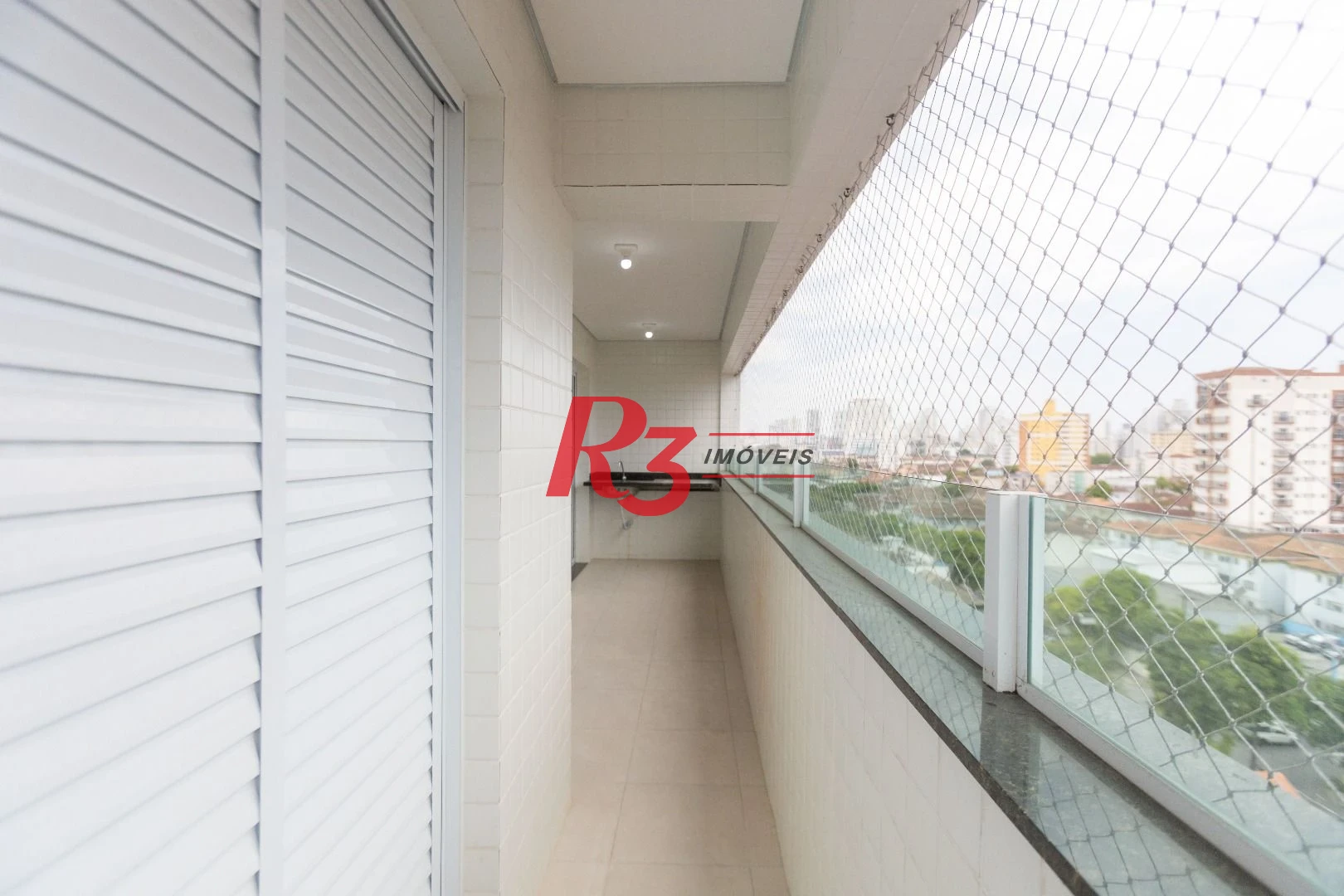 Apartamento com 2 dormitórios à venda, 61 m² por R$ 540.000,00 - Macuco - Santos/SP