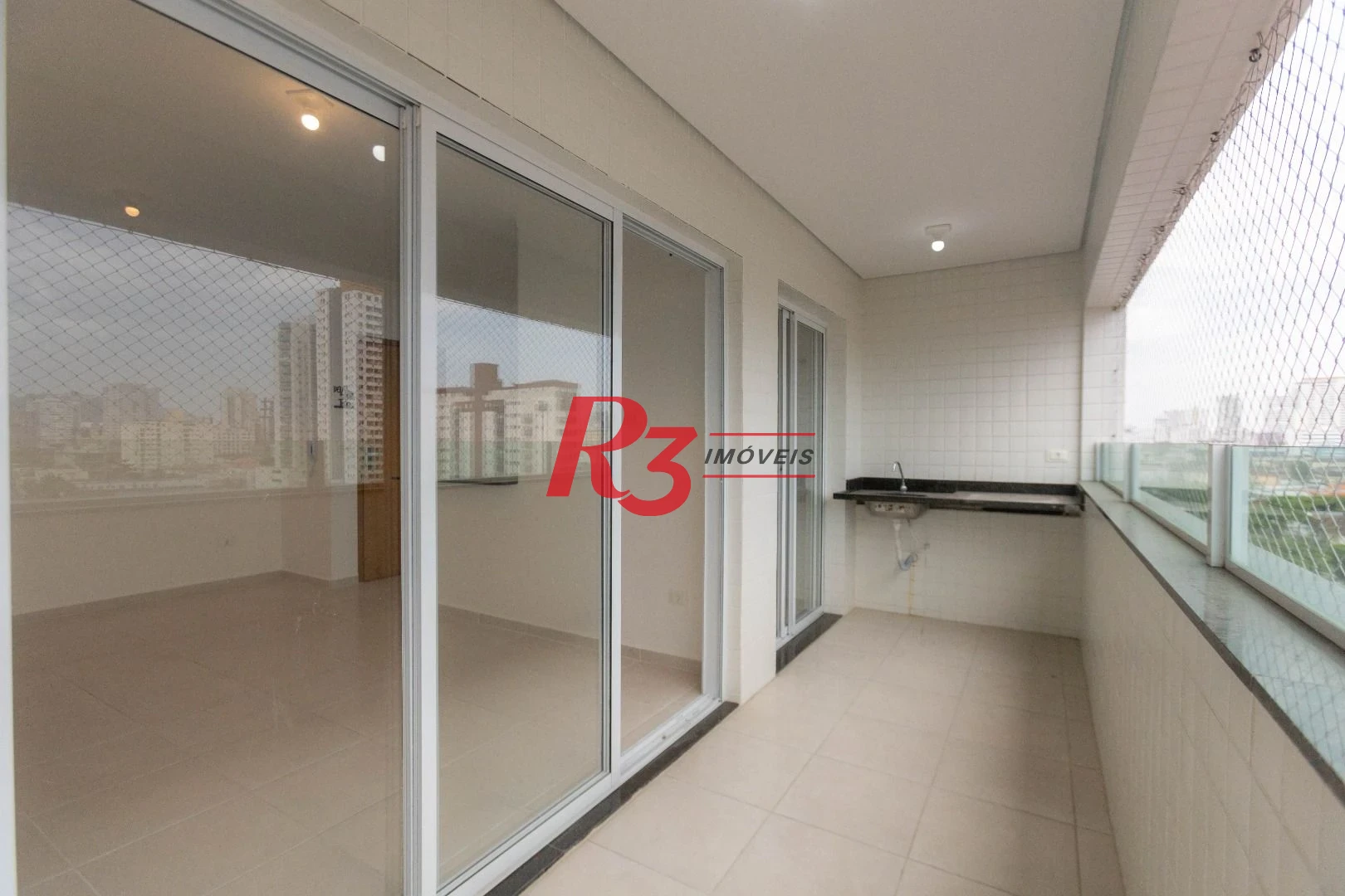 Apartamento com 2 dormitórios à venda, 61 m² por R$ 540.000,00 - Macuco - Santos/SP