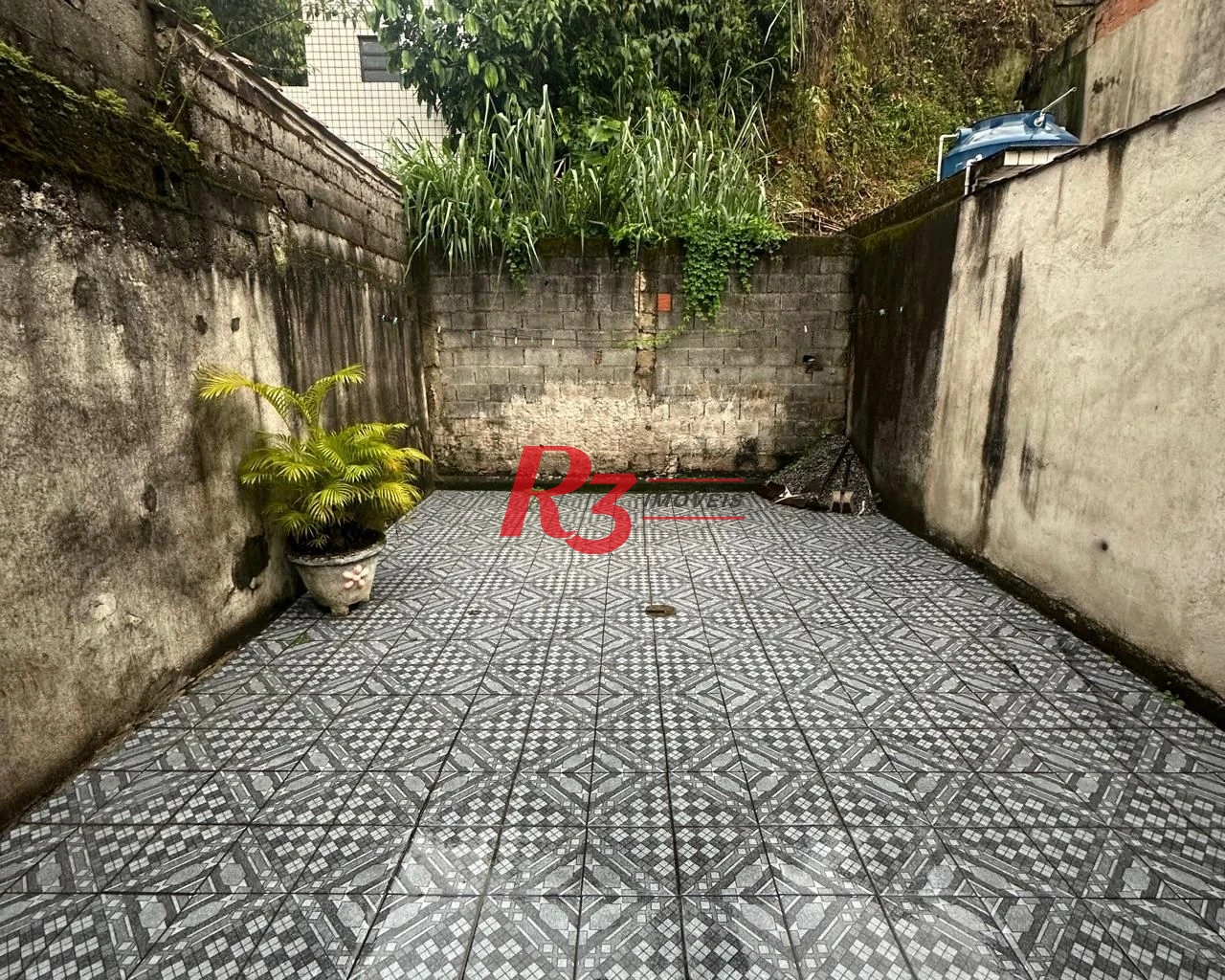 Sobrado com 2 dormitórios à venda, 300 m² por R$ 650.000,00 - Morro de Nova Cintra - Santos/SP