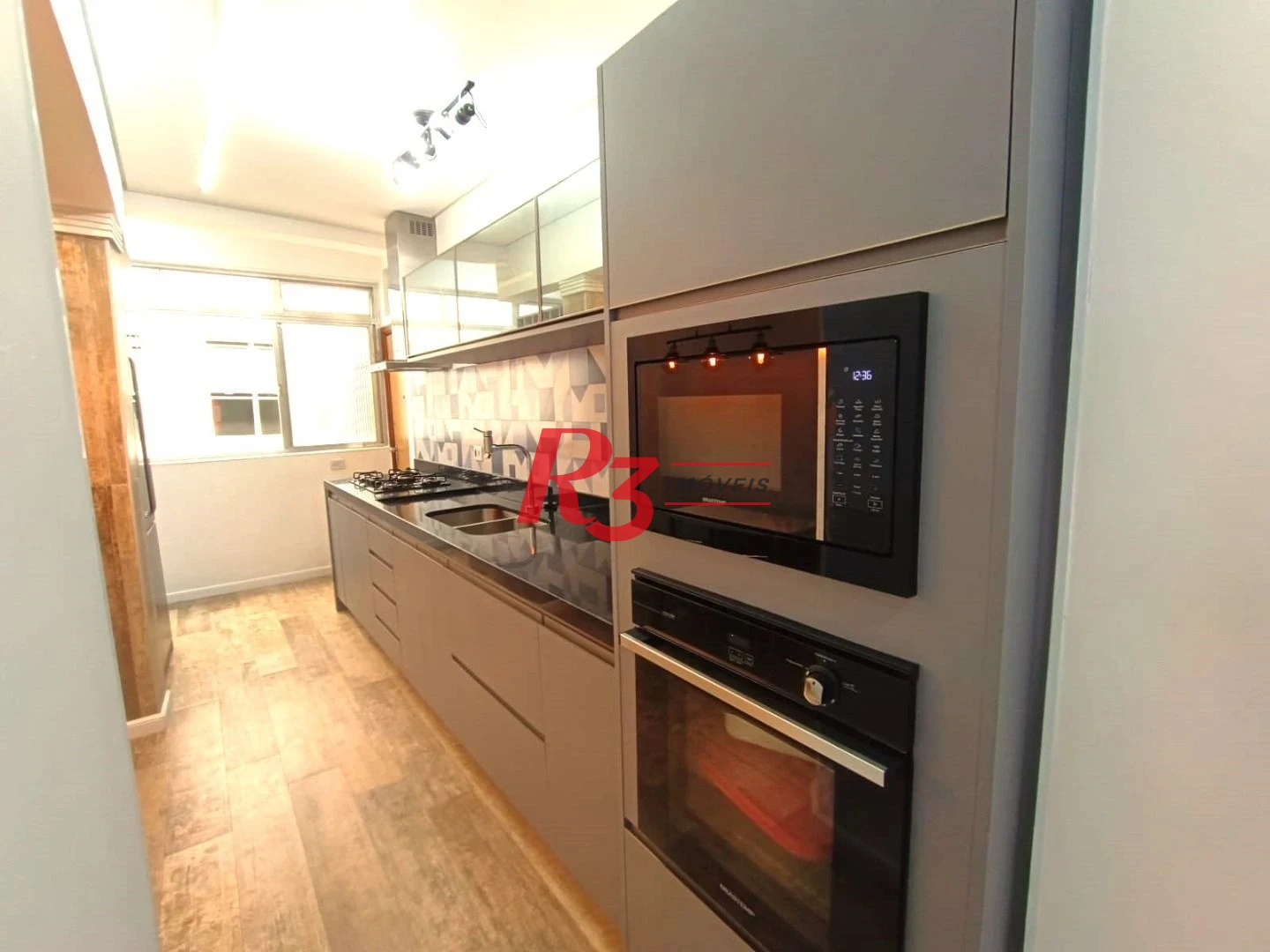 Apartamento com 2 dormitórios à venda, 133 m² por R$ 1.050.000,00 - Embaré - Santos/SP