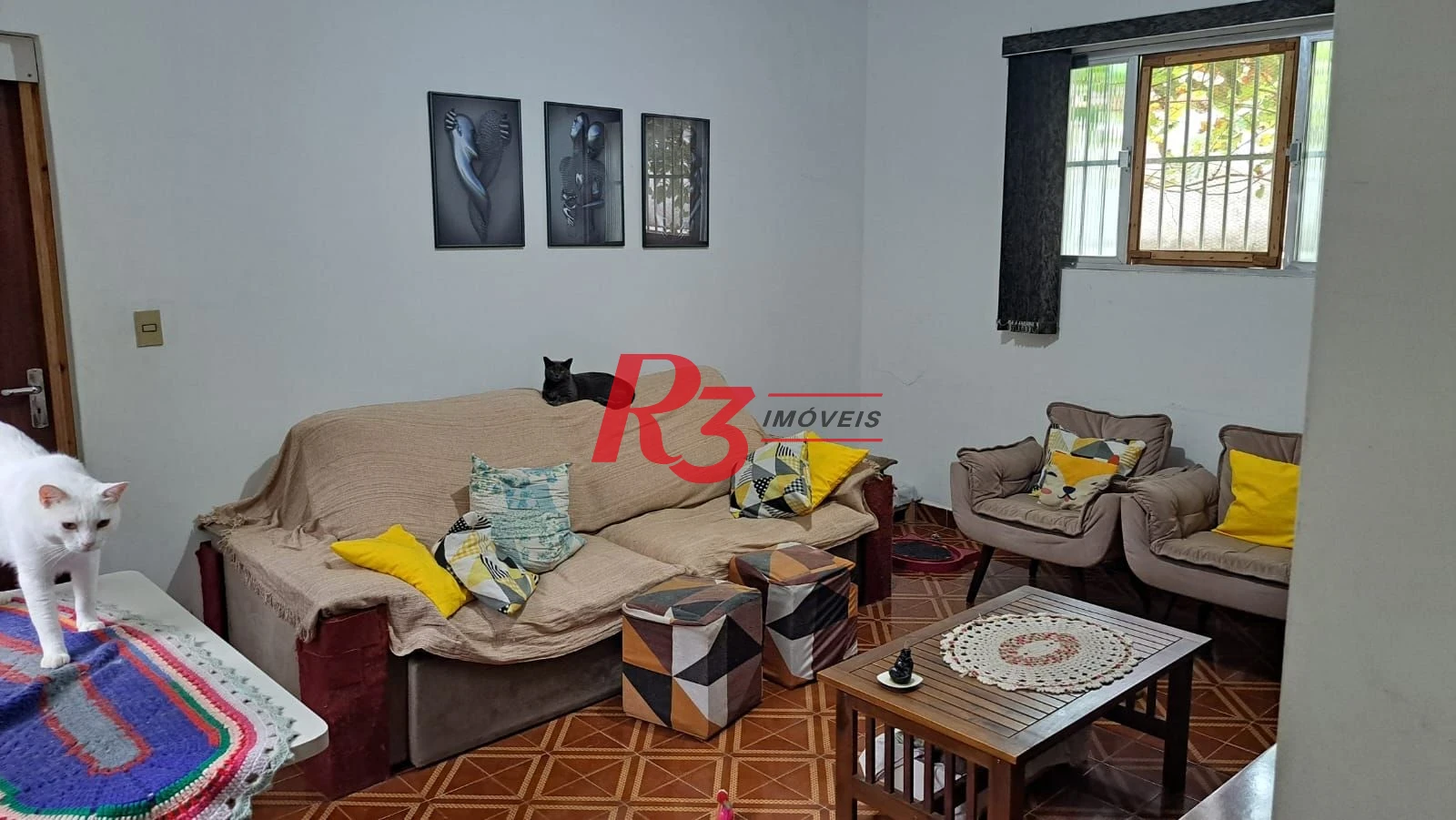 Casa com 3 dormitórios à venda, 155 m² por R$ 950.000,00 - Estuário - Santos/SP