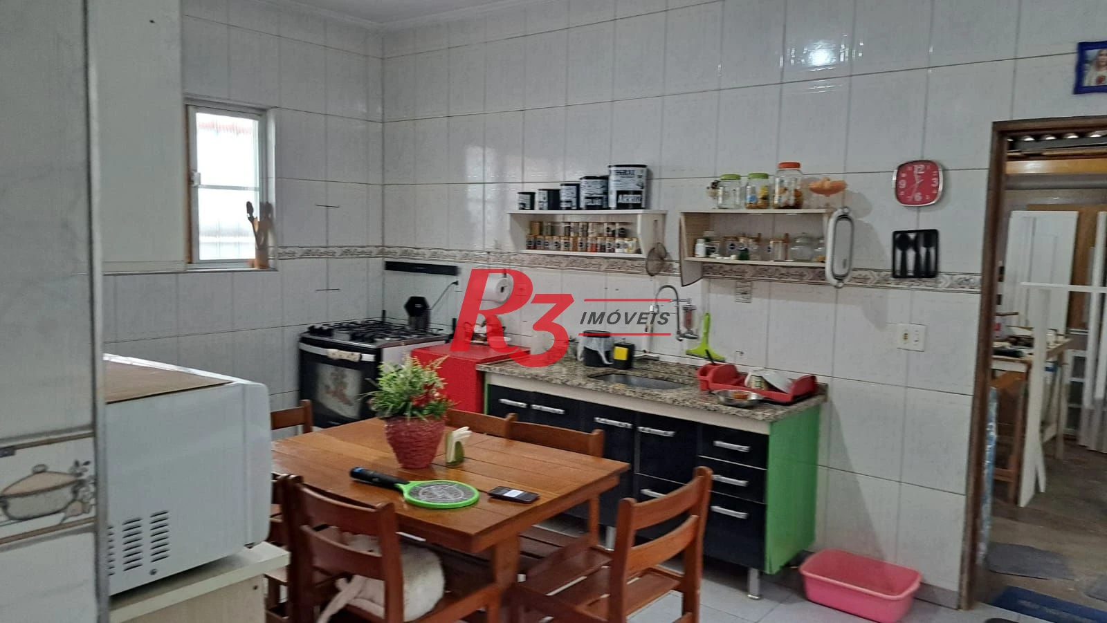 Casa com 3 dormitórios à venda, 155 m² por R$ 950.000,00 - Estuário - Santos/SP