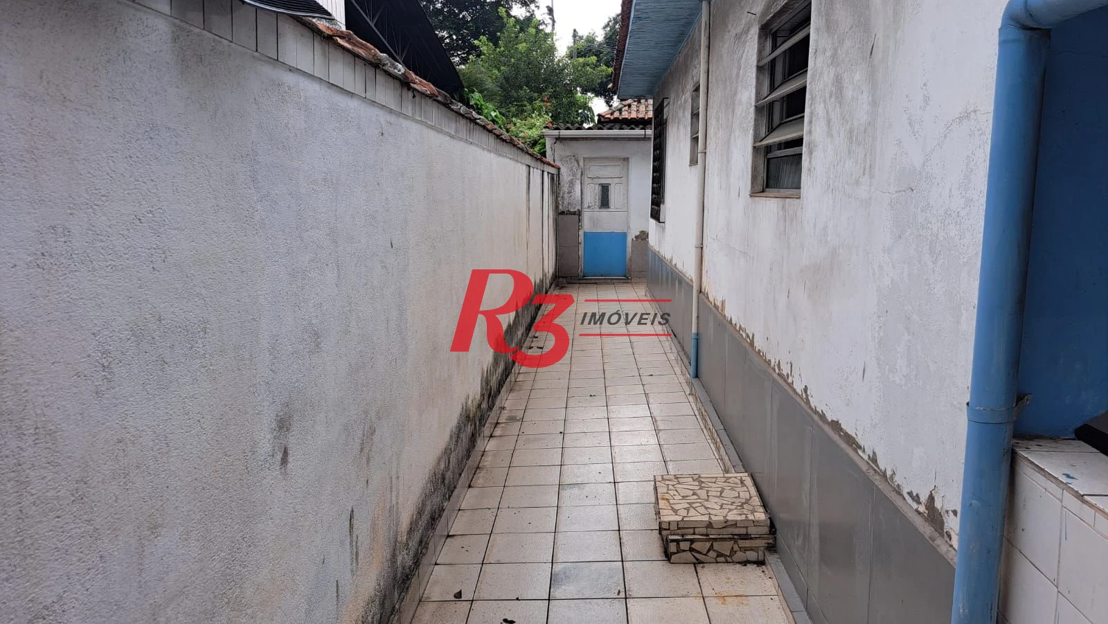 Casa com 3 dormitórios à venda, 155 m² por R$ 950.000,00 - Estuário - Santos/SP