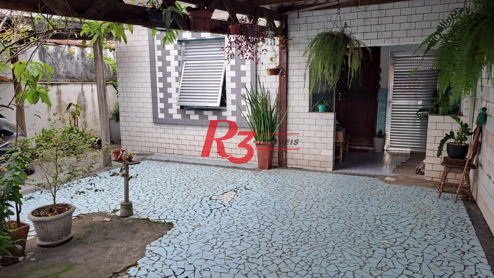 Casa com 3 dormitórios à venda, 155 m² por R$ 950.000,00 - Estuário - Santos/SP
