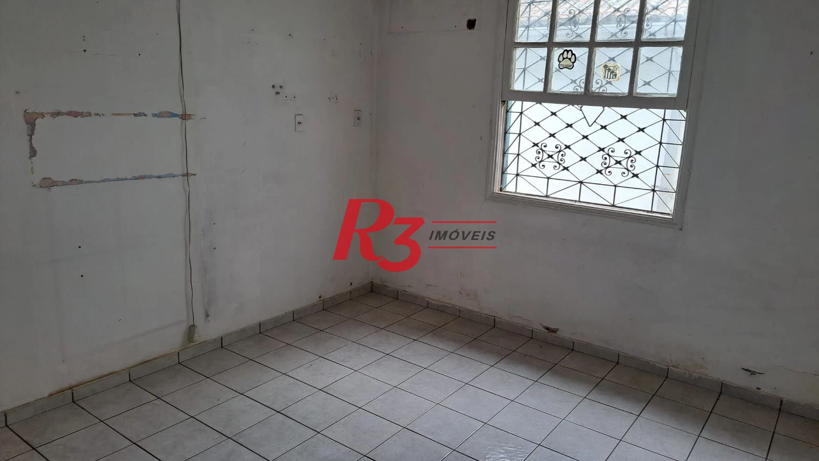 Casa com 3 dormitórios à venda, 155 m² por R$ 950.000,00 - Estuário - Santos/SP