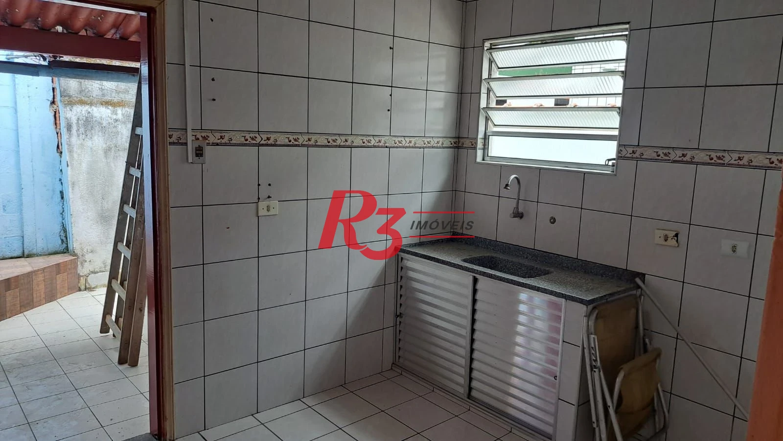 Casa com 3 dormitórios à venda, 155 m² por R$ 950.000,00 - Estuário - Santos/SP