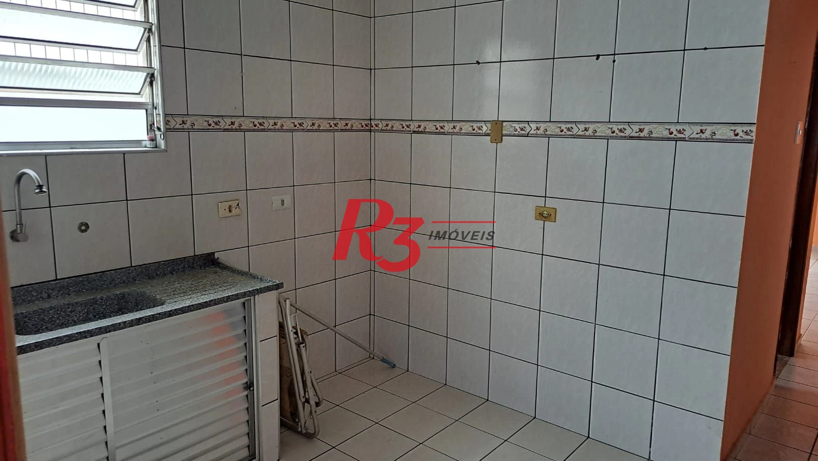 Casa com 3 dormitórios à venda, 155 m² por R$ 950.000,00 - Estuário - Santos/SP