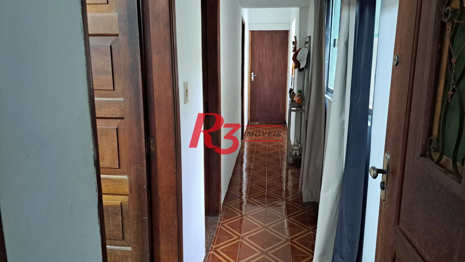 Casa com 3 dormitórios à venda, 155 m² por R$ 950.000,00 - Estuário - Santos/SP