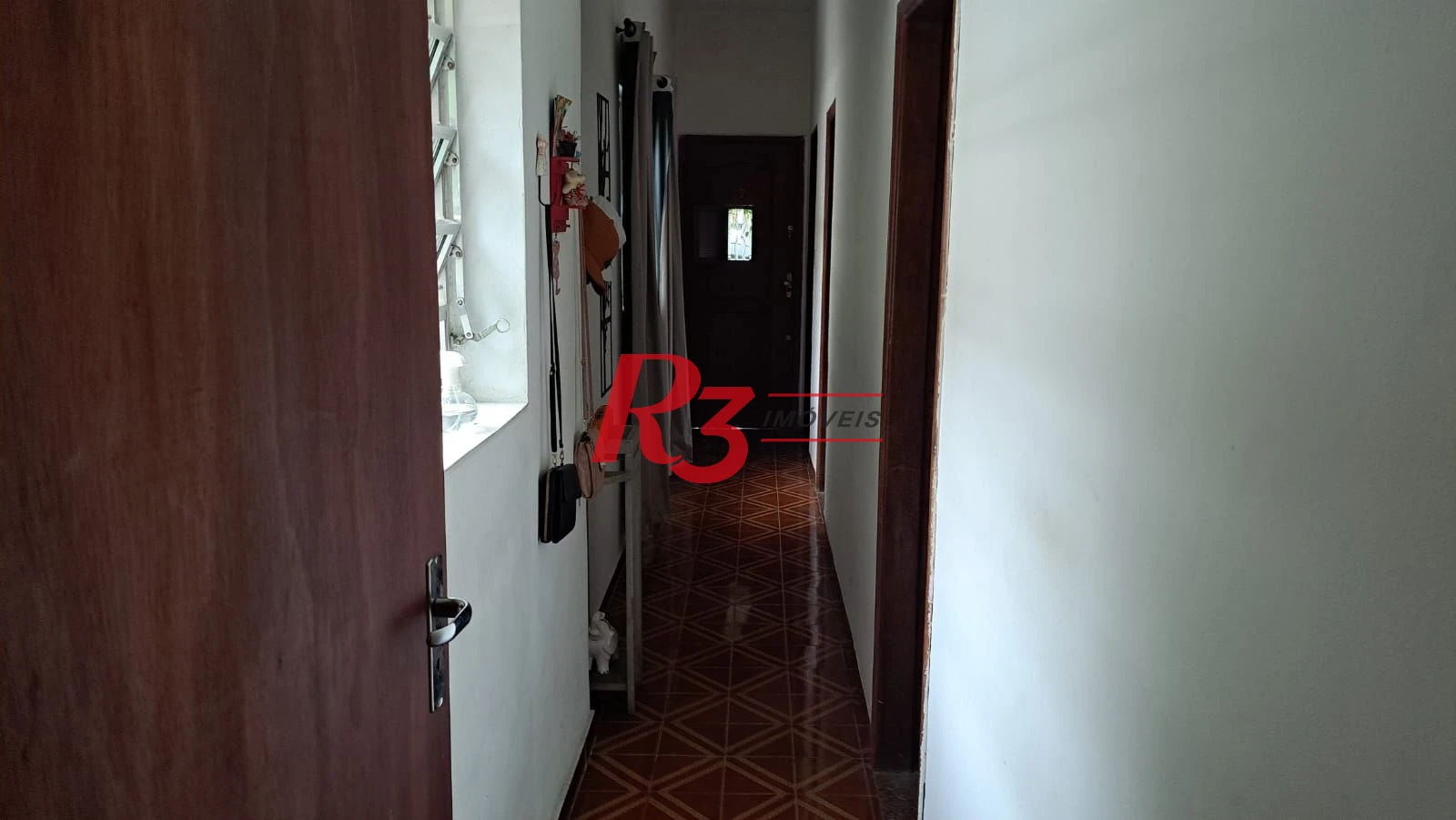 Casa com 3 dormitórios à venda, 155 m² por R$ 950.000,00 - Estuário - Santos/SP