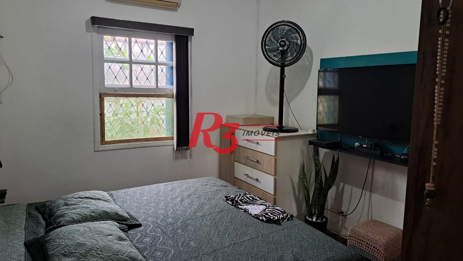 Casa com 3 dormitórios à venda, 155 m² por R$ 950.000,00 - Estuário - Santos/SP