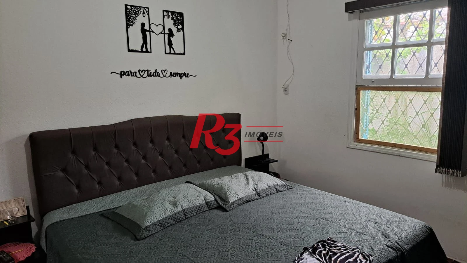 Casa com 3 dormitórios à venda, 155 m² por R$ 950.000,00 - Estuário - Santos/SP