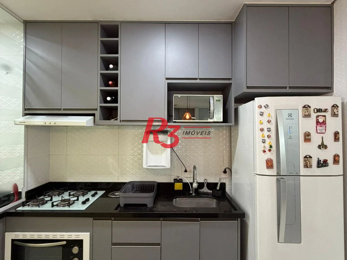 Apartamento com 2 dormitórios à venda, 46 m² por R$ 380.000,00 - Areia Branca - Santos/SP