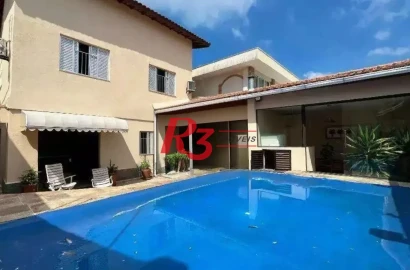Casa com 3 dormitórios à venda, 280 m² por R$ 1.000.000,00 - Jardim Helena Maria - Guarujá/SP