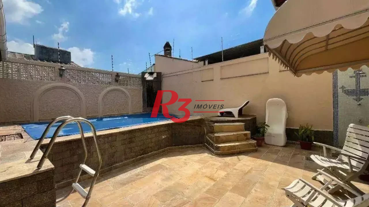 Casa com 3 dormitórios à venda, 280 m² por R$ 1.000.000,00 - Jardim Helena Maria - Guarujá/SP
