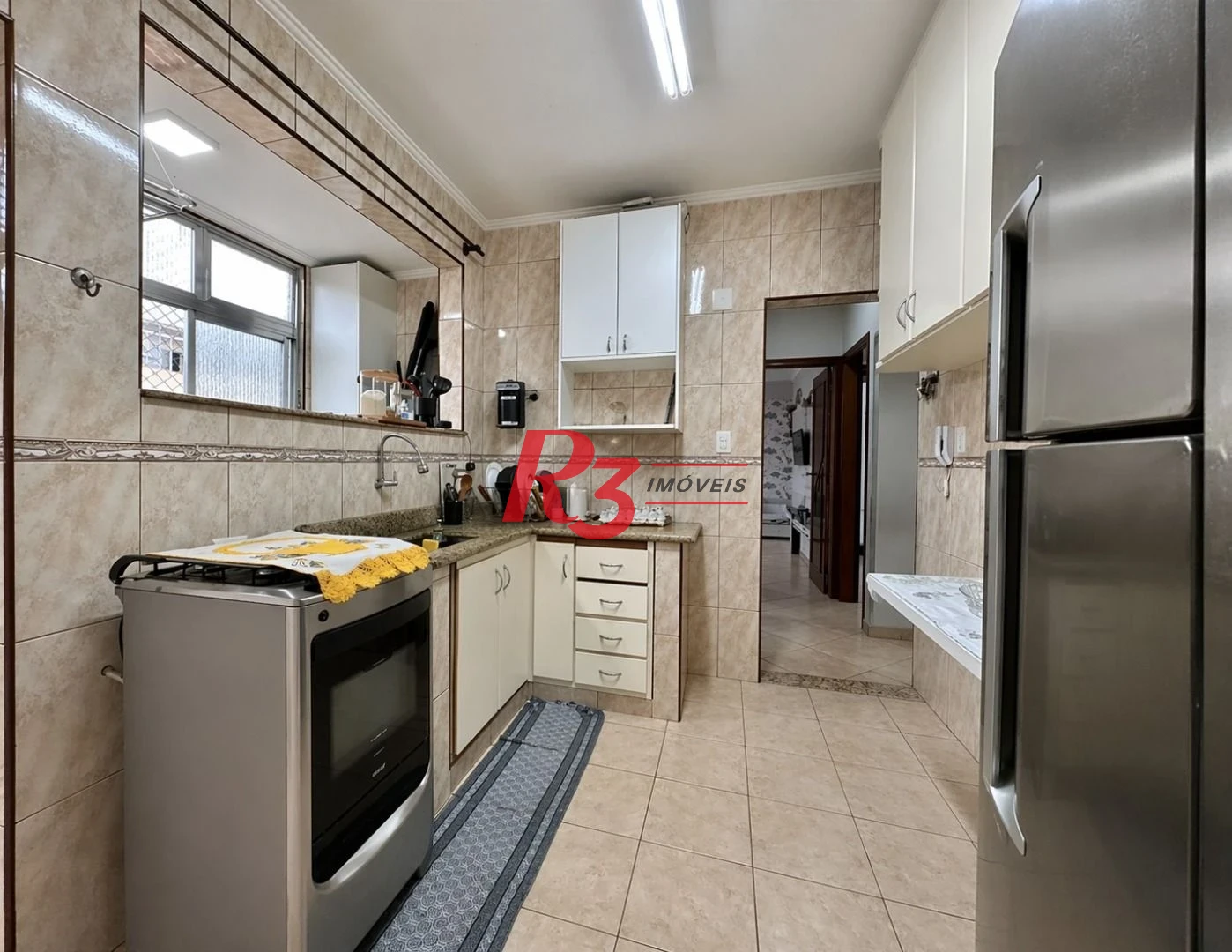 Apartamento com 2 dormitórios à venda, 60 m² por R$ 450.000,00 - Embaré - Santos/SP
