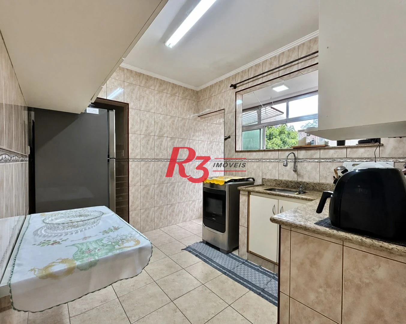 Apartamento com 2 dormitórios à venda, 60 m² por R$ 450.000,00 - Embaré - Santos/SP