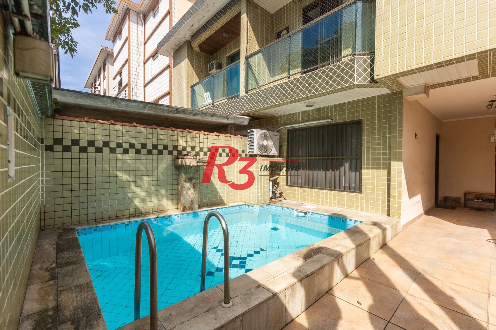 Casa com 3 dormitórios à venda, 159 m² por R$ 1.700.000,00 - Aparecida - Santos/SP