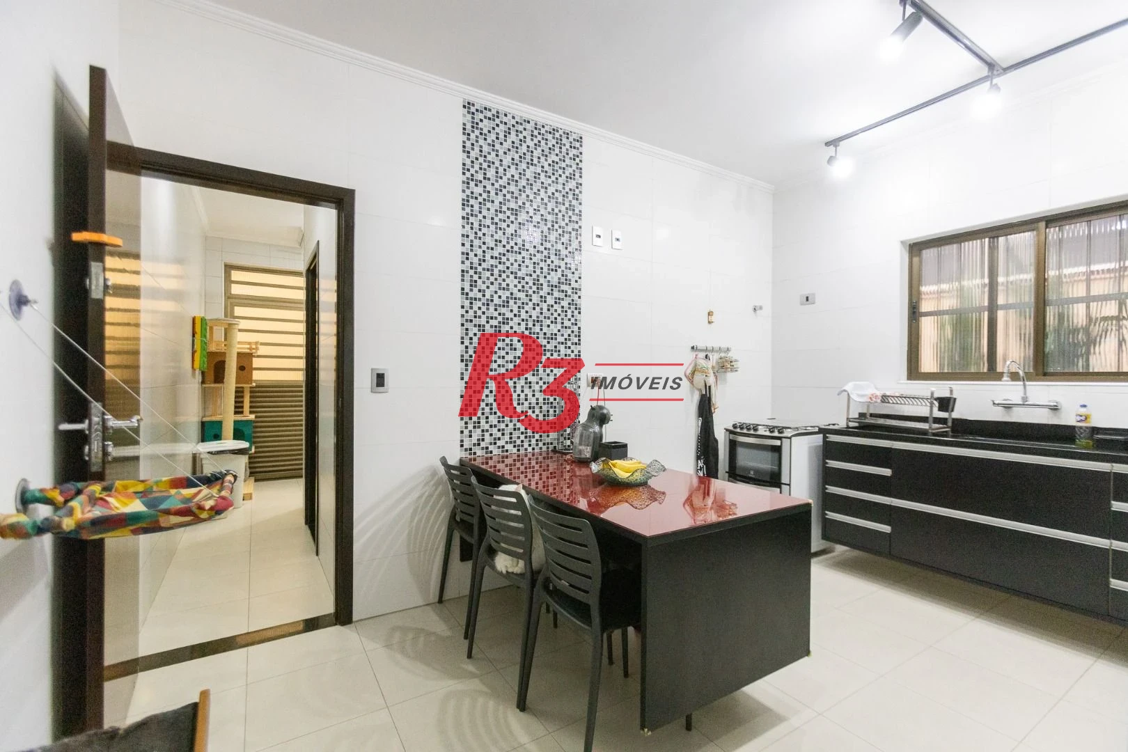 Casa com 3 dormitórios à venda, 159 m² por R$ 1.700.000,00 - Aparecida - Santos/SP