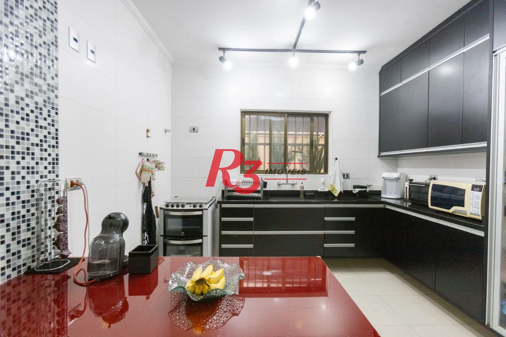 Casa com 3 dormitórios à venda, 159 m² por R$ 1.700.000,00 - Aparecida - Santos/SP