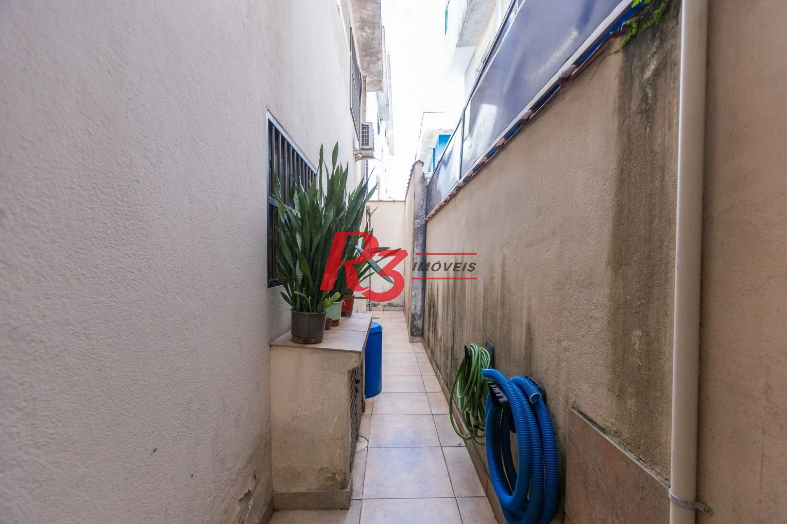 Casa com 3 dormitórios à venda, 159 m² por R$ 1.700.000,00 - Aparecida - Santos/SP