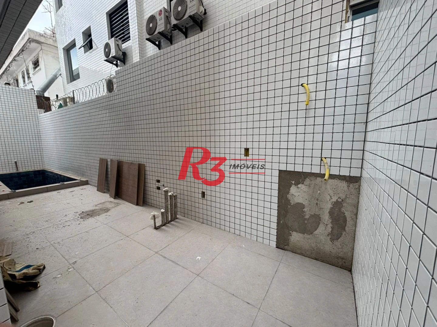 Casa com 3 dormitórios à venda, 120 m² por R$ 1.600.000,00 - Ponta da Praia - Santos/SP