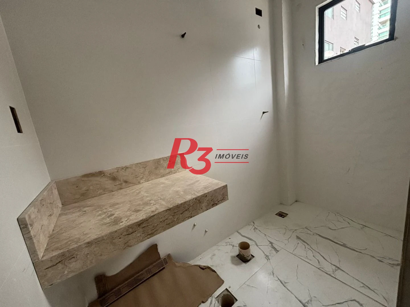 Casa com 3 dormitórios à venda, 132 m² por R$ 1.550.000,00 - Ponta da Praia - Santos/SP
