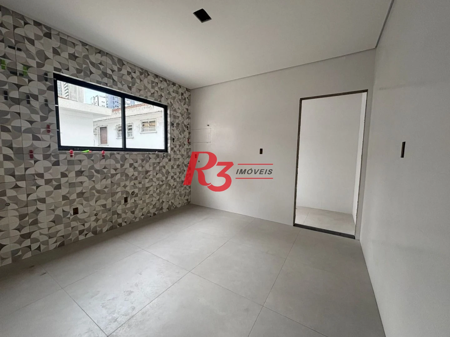Casa com 3 dormitórios à venda, 132 m² por R$ 1.550.000,00 - Ponta da Praia - Santos/SP