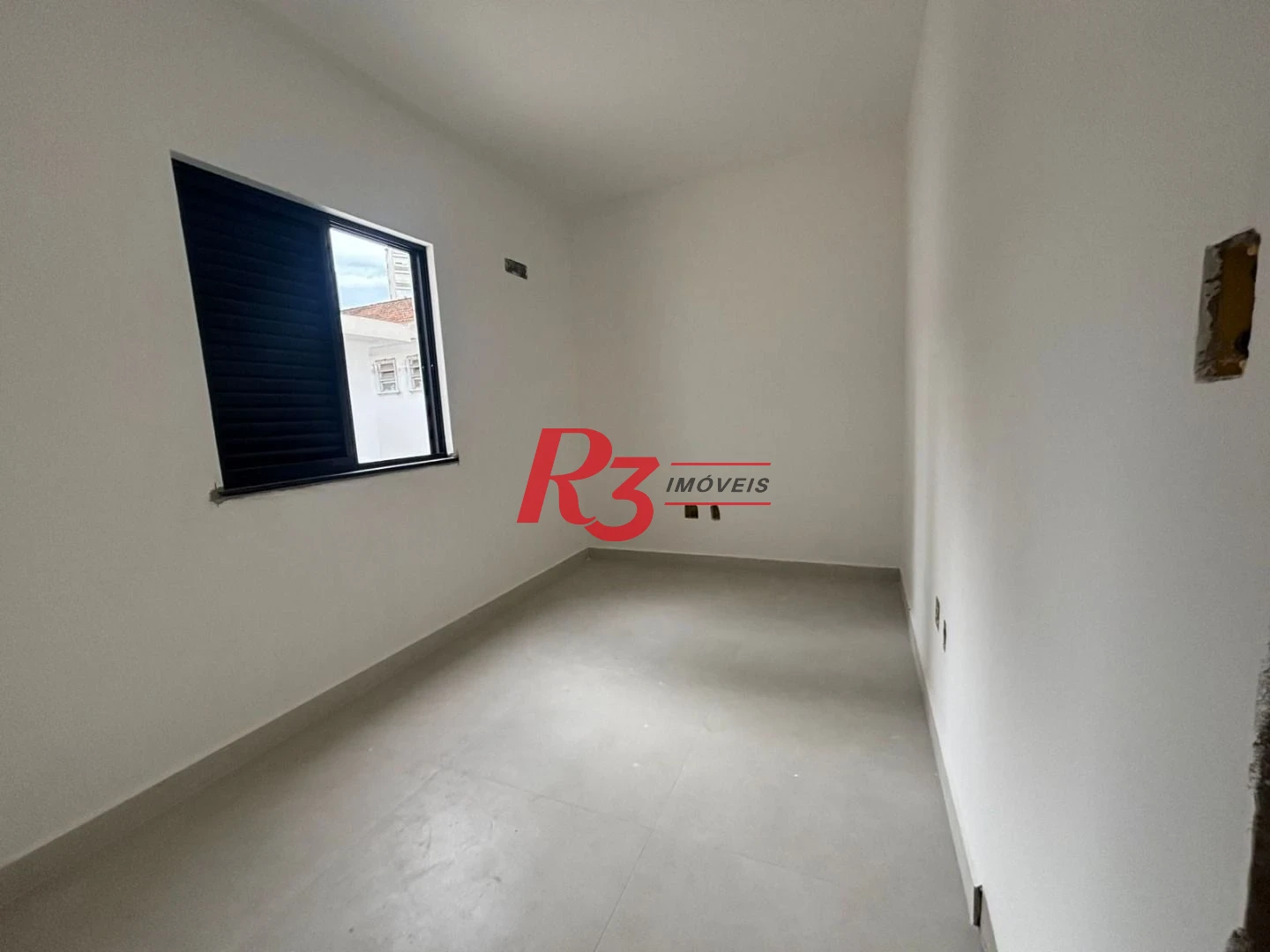 Casa com 3 dormitórios à venda, 132 m² por R$ 1.550.000,00 - Ponta da Praia - Santos/SP
