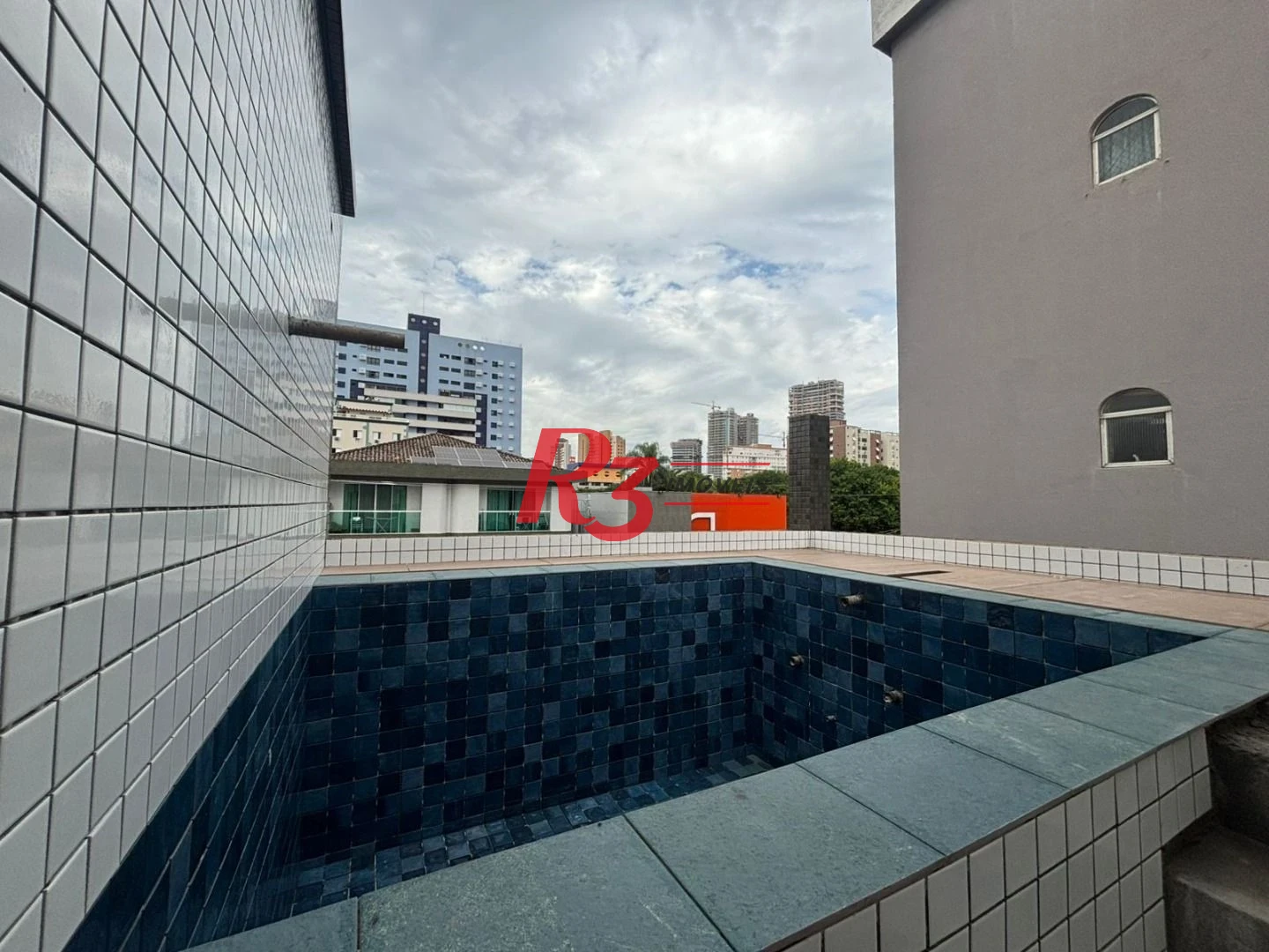 Casa com 3 dormitórios à venda, 132 m² por R$ 1.550.000,00 - Ponta da Praia - Santos/SP
