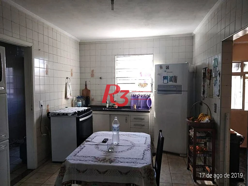 Casa com 3 dormitórios à venda, 140 m² por R$ 410.000,00 - Areia Branca - Santos/SP