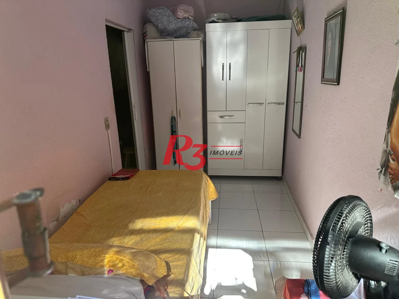 Casa com 3 dormitórios à venda, 140 m² por R$ 410.000,00 - Areia Branca - Santos/SP