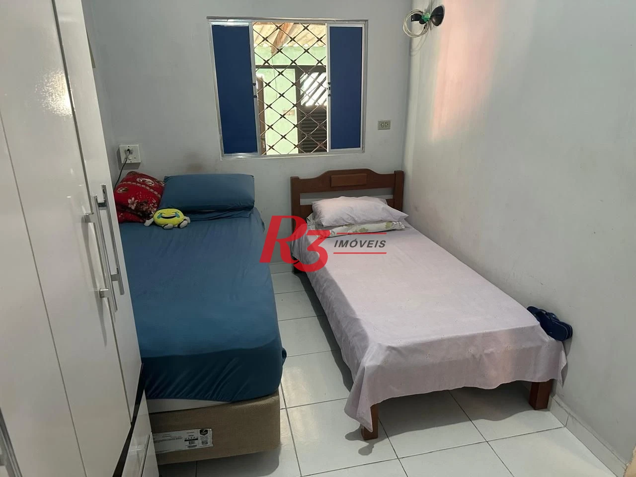 Casa com 3 dormitórios à venda, 140 m² por R$ 410.000,00 - Areia Branca - Santos/SP