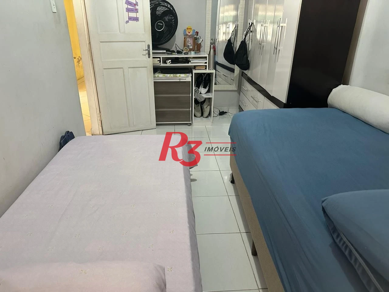 Casa com 3 dormitórios à venda, 140 m² por R$ 410.000,00 - Areia Branca - Santos/SP