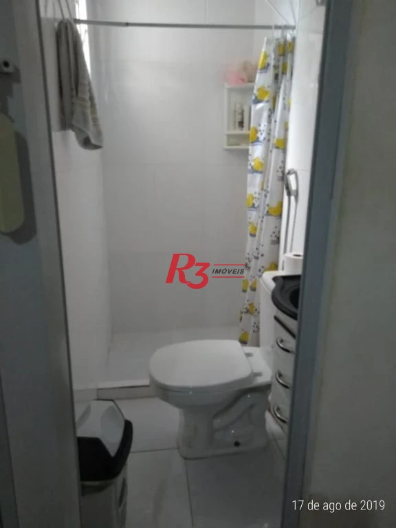 Casa com 3 dormitórios à venda, 140 m² por R$ 410.000,00 - Areia Branca - Santos/SP