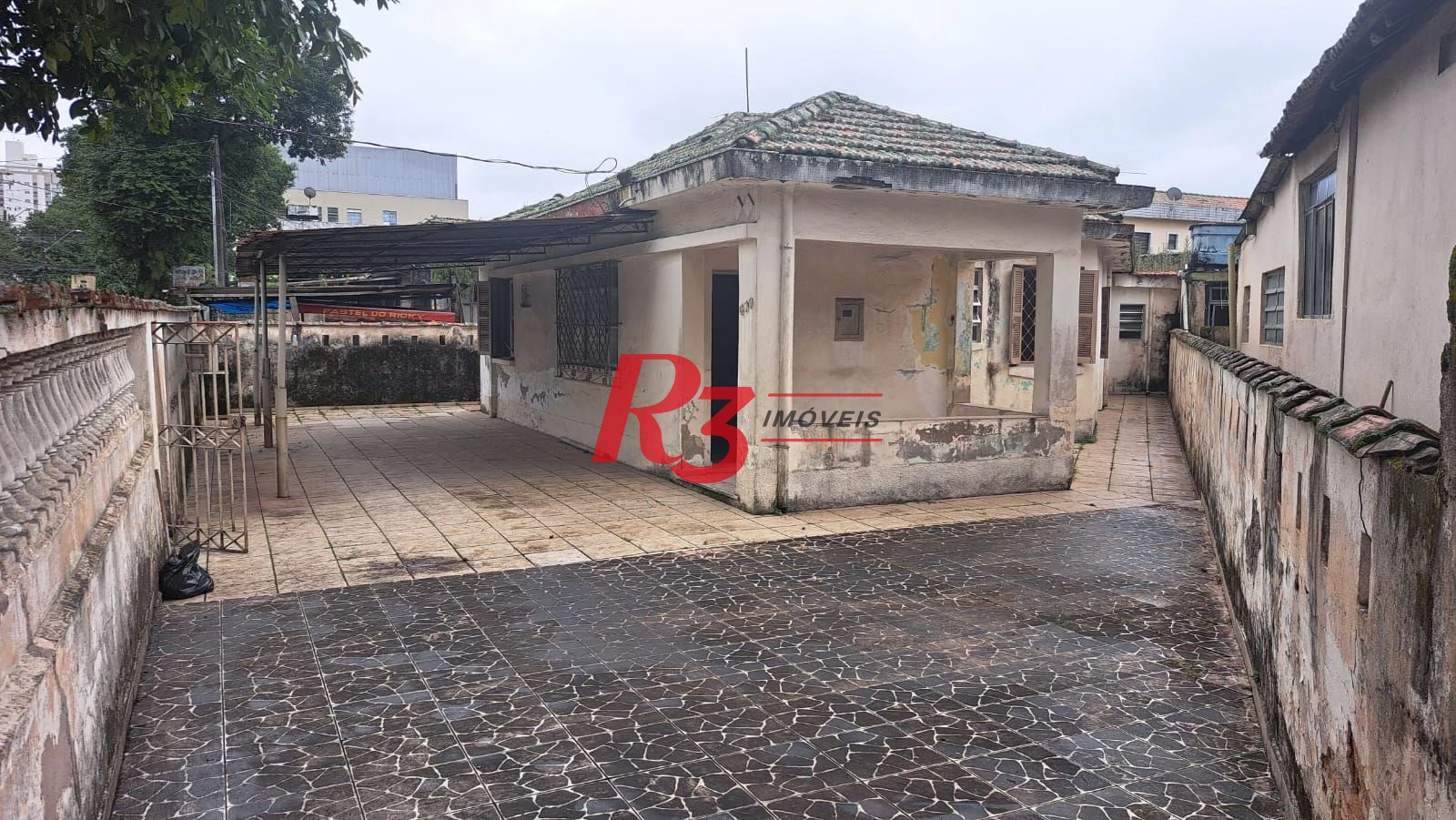 Casa com 3 dormitórios à venda, 131 m² por R$ 600.000,00 - Aparecida - Santos/SP
