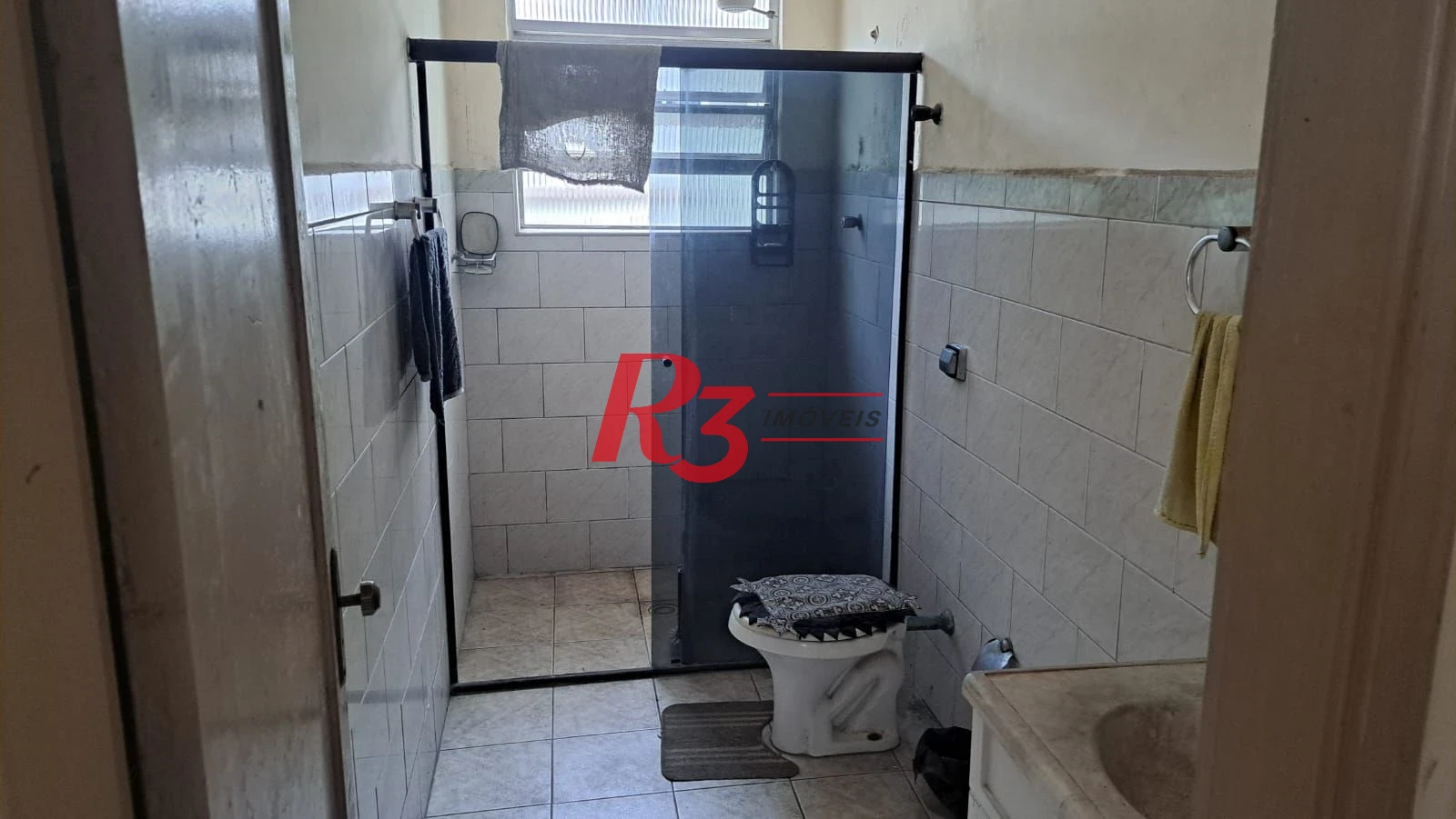 Casa com 3 dormitórios à venda, 131 m² por R$ 600.000,00 - Aparecida - Santos/SP