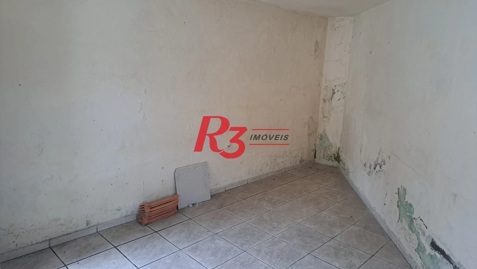 Casa com 3 dormitórios à venda, 131 m² por R$ 600.000,00 - Aparecida - Santos/SP