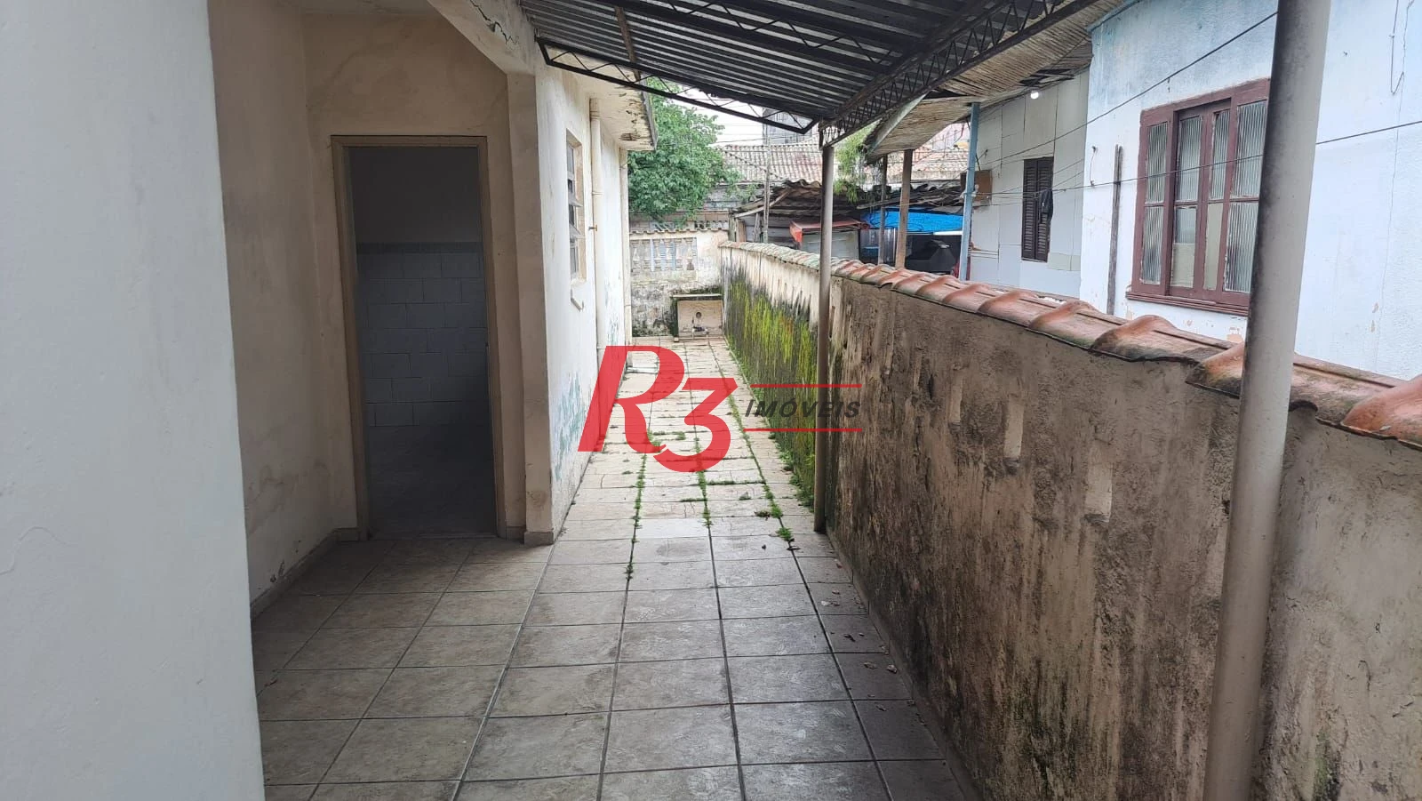 Casa com 3 dormitórios à venda, 131 m² por R$ 600.000,00 - Aparecida - Santos/SP