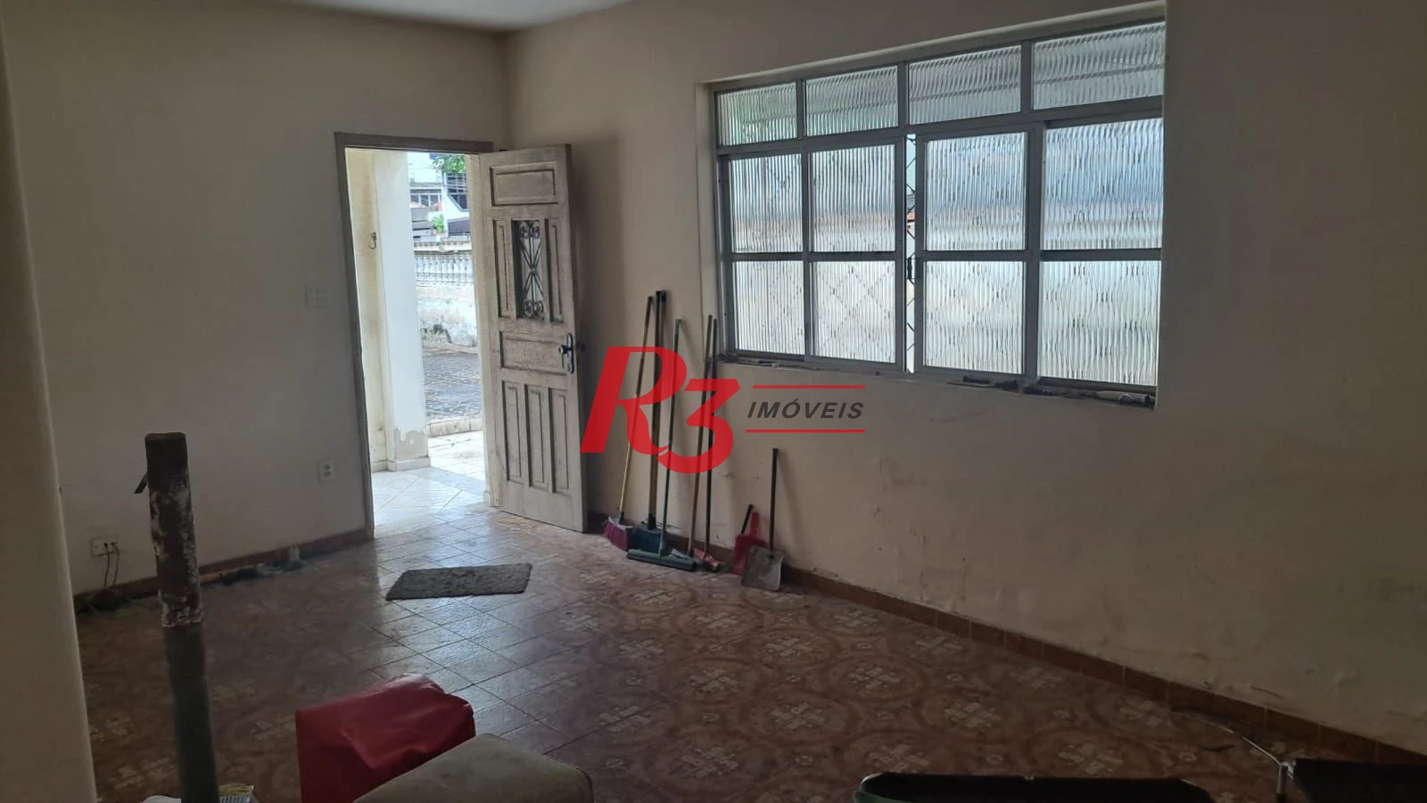 Casa com 3 dormitórios à venda, 131 m² por R$ 600.000,00 - Aparecida - Santos/SP